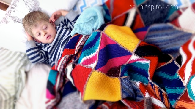 Snuggled in our giant king plus cot co-sleep bed