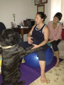 Leo lending a helping hand, Aurelia deep breathing  and me with the blessed hot water bottle
